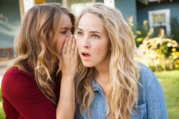 Two friends gossiping. Photo: Jessica Peterson