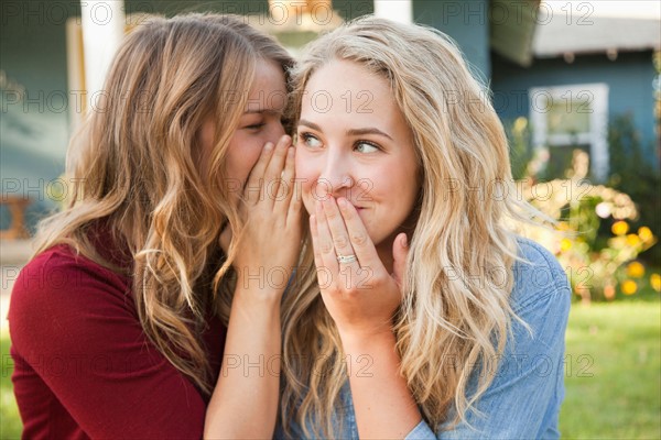 Two friends gossiping. Photo: Jessica Peterson