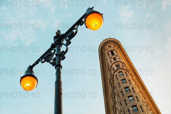 Flatiron building with street lamp.