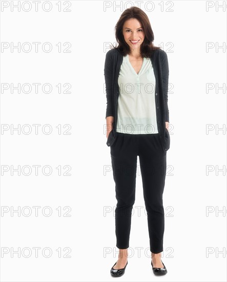 Studio portrait of mid adult woman.