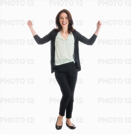 Studio portrait of mid adult woman.