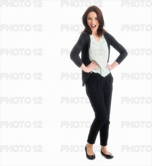 Studio portrait of mid adult woman.