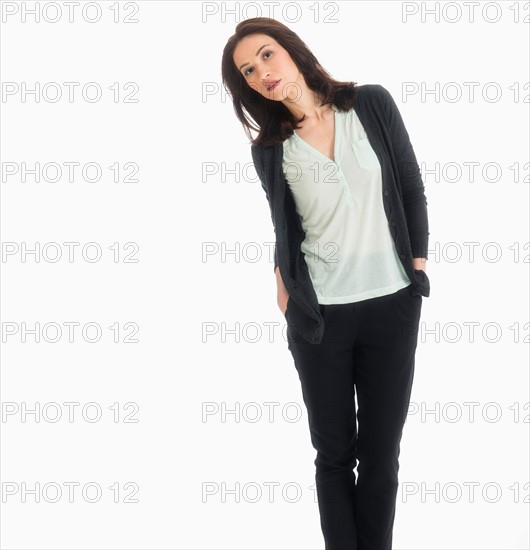 Studio portrait of mid adult woman.