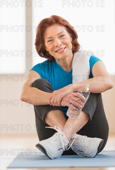 Portrait of senior woman in gym.