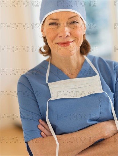 Portrait of smiling female surgeon.