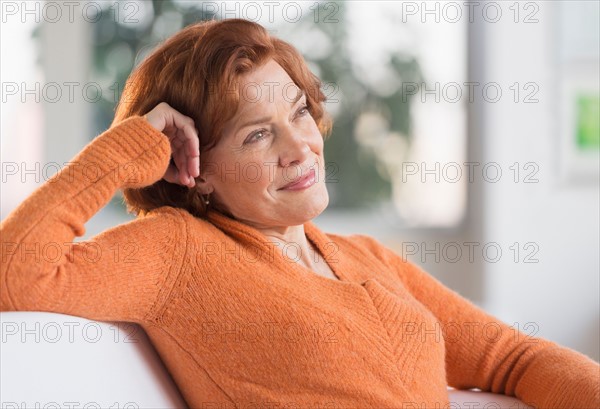 Woman relaxing at home.