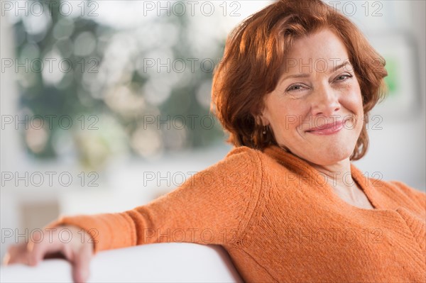 Woman relaxing at home.