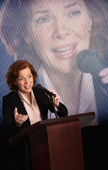 Female politician performing speech.