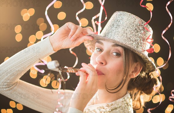 Woman celebrating New Year's Eve.