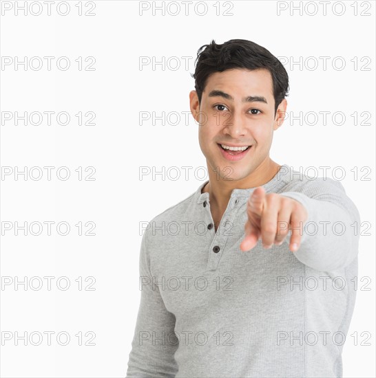 Studio portrait of young man.