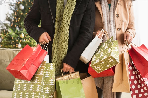 Couple with Christmas shopping.