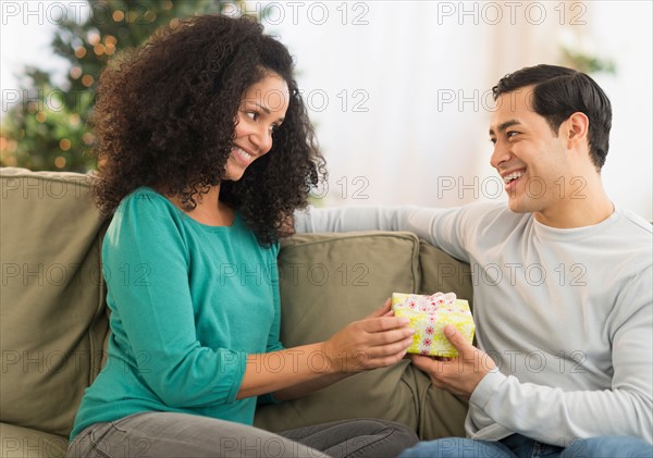 Couple with Christmas gifts.