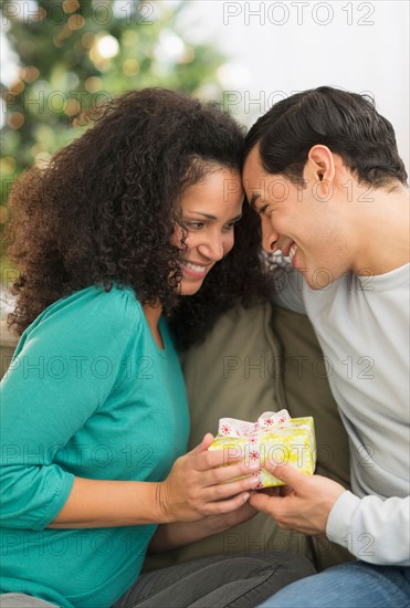 Couple with Christmas gifts.