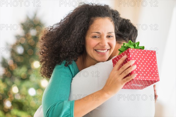 Couple with Christmas gifts.