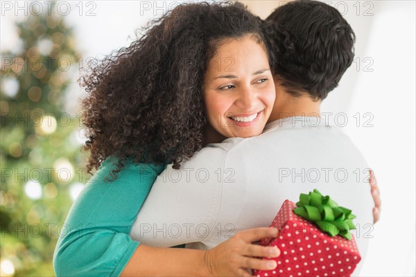 Couple with Christmas gifts.