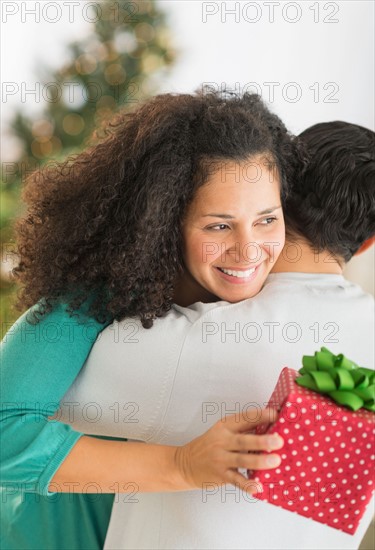 Couple with Christmas gifts.
