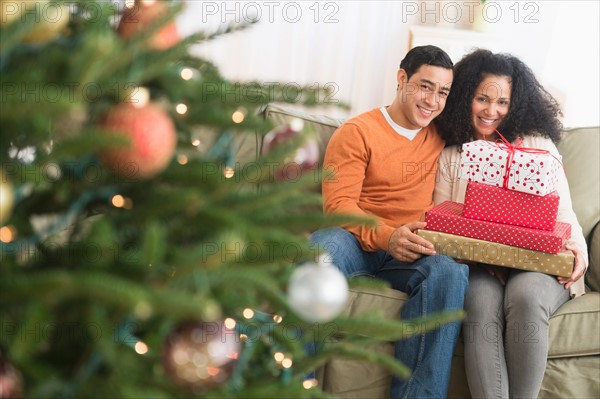 Couple with Christmas gifts.