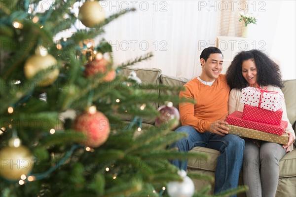 Couple with Christmas gifts.