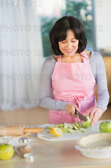 Senior woman baking.