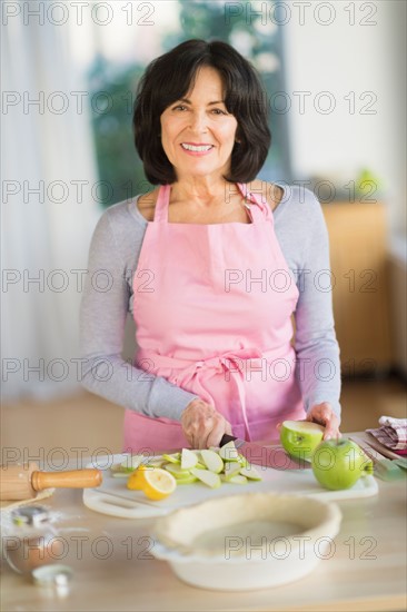 Senior woman baking.