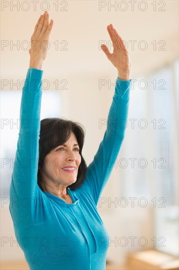 Portrait of senior woman exercising.