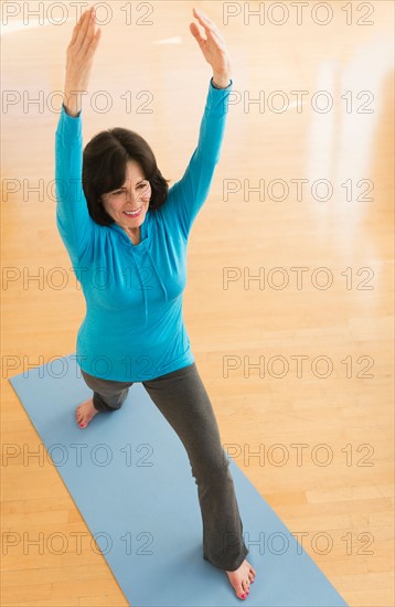 Portrait of senior woman exercising.