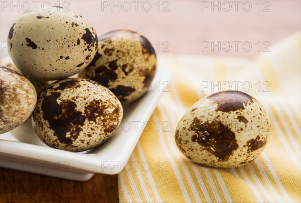 Quail eggs on table.