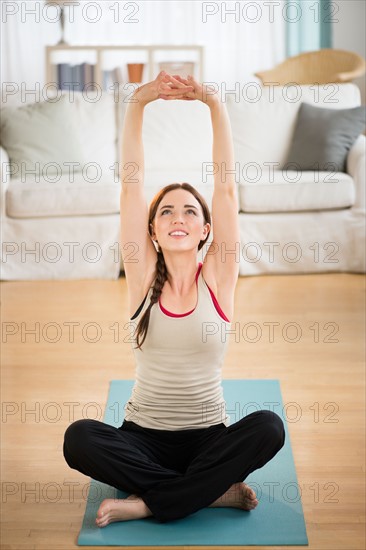 Young woman practicing yoga