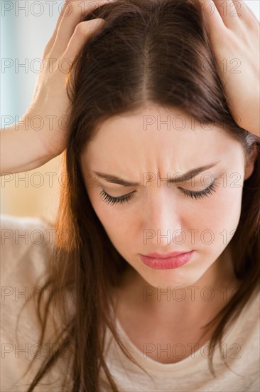 Woman suffering from headache