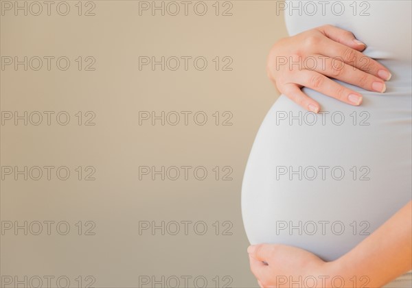Close-up of pregnant woman's belly