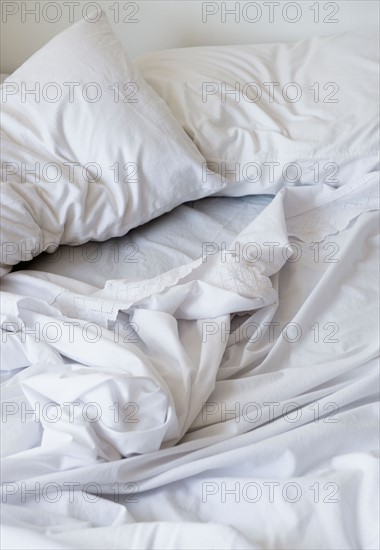 White bedclothing in mess