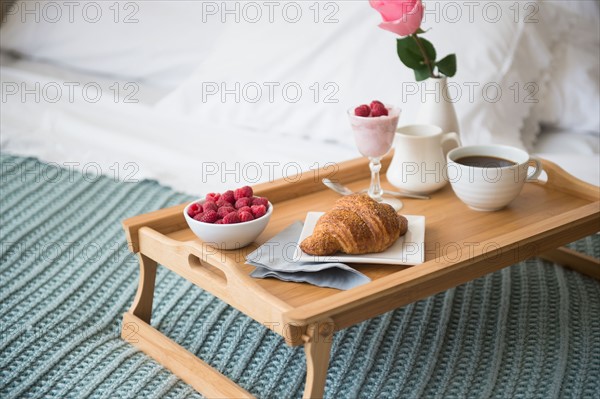 Breakfast plate on bed