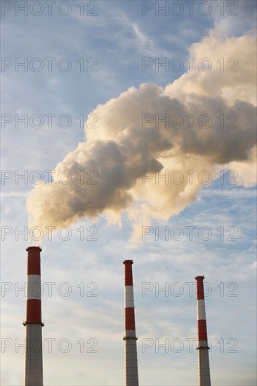 Smoke emitting from smoke stacks