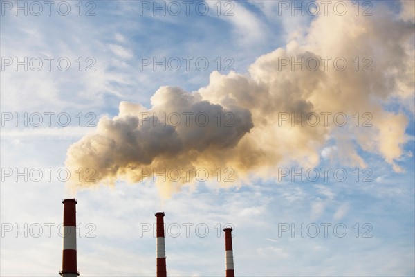 Smoke emitting from smoke stacks