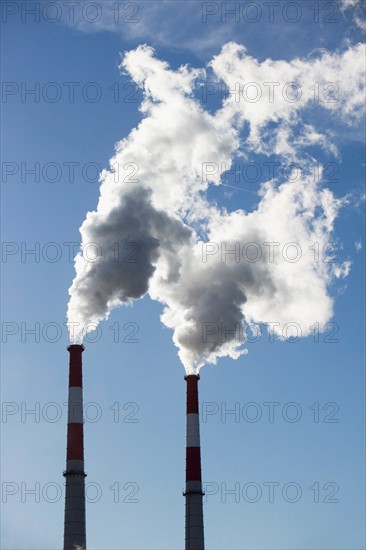 Smoke emitting from smoke stacks