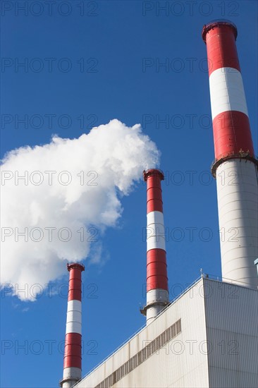 Smoke emitting from smoke stacks