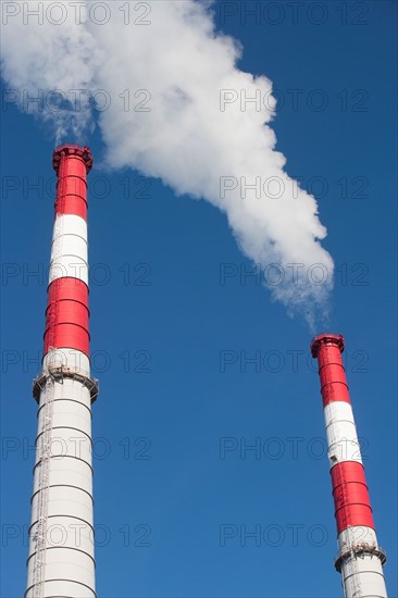 Smoke emitting from smoke stacks