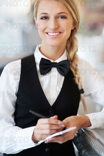 Portrait of smiling waitress