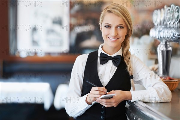 Portrait of smiling waitress