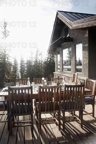 Outdoor table and chairs in front of house