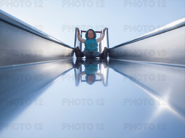 Toddler on slide