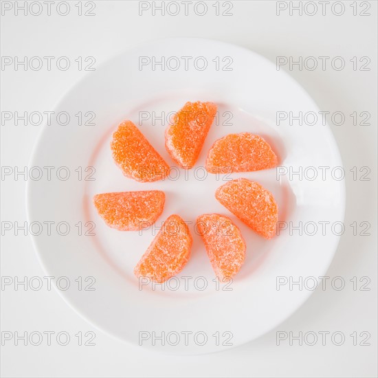 Studio Shot of candies imitating orange
