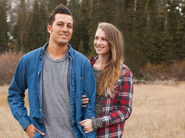 Portrait of young couple in non-urban scene