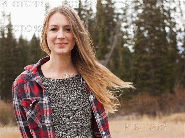 Portrait of young woman in non-urban scene