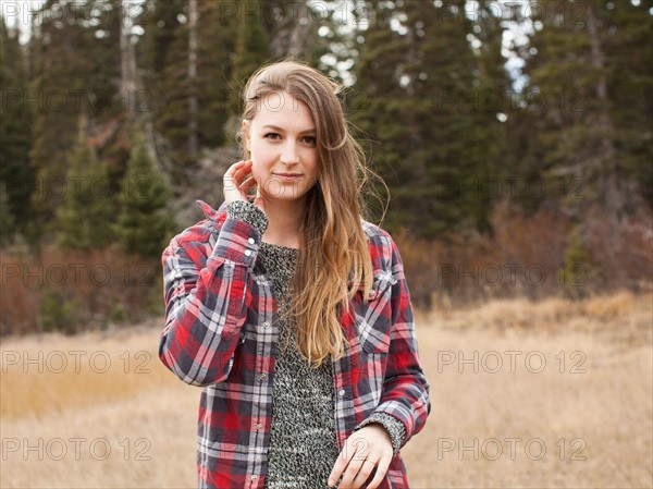 Portrait of young woman in non-urban scene