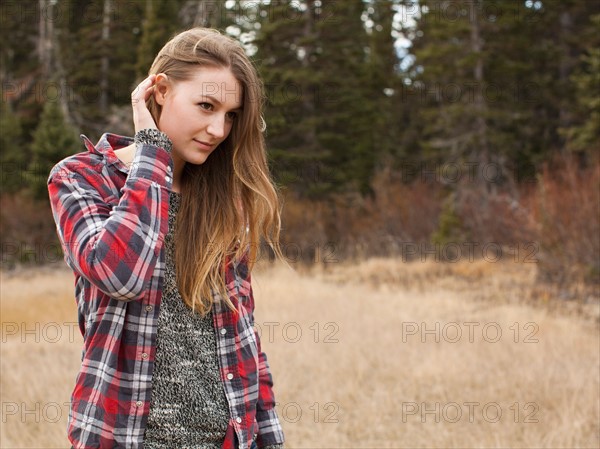 Portrait of young woman in non-urban scene