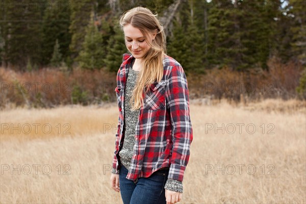 Portrait of young woman in non-urban scene