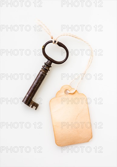 Antique key with tag.