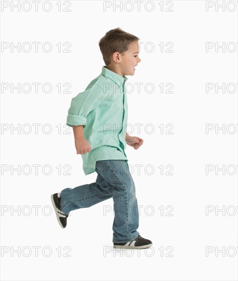 Boy (4-5) running.