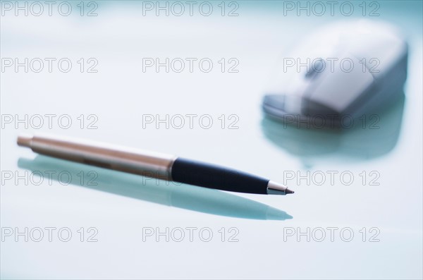 Pen and computer mouse.